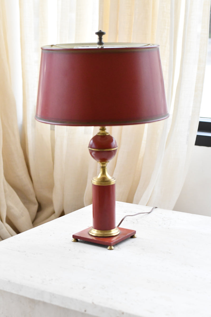 Vintage red tole lamp with brass accents and original shade